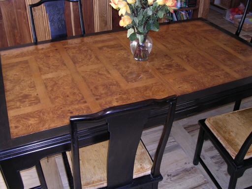 Burl veneer table with black border after